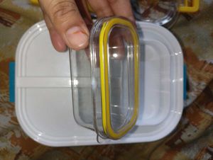 a lunch box in blue and white colour