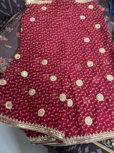 Elegant Maroon Saree with Gold Embroidery