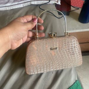 Elegant Rose Gold Clutch Bag