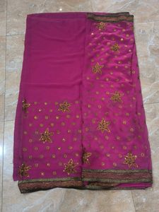 Stunning Pink Saree with Gold Embellishments