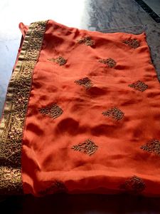 Elegant Orange Embroidered Saree