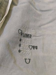 Stylish Light Blue Jeans with Fun Graphics