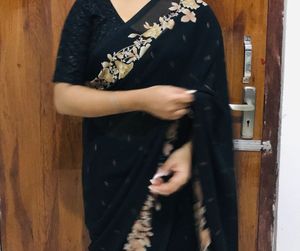 Elegant Black Saree with Floral Border
