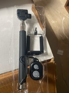 unused Selfie Stick with Bluetooth Remote