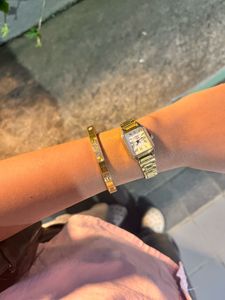 Elegant Gold Watch and Bracelet Set