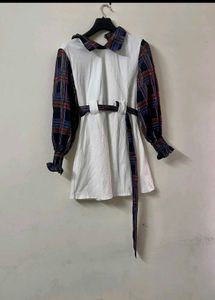 Chic White Dress with Plaid Sleeves