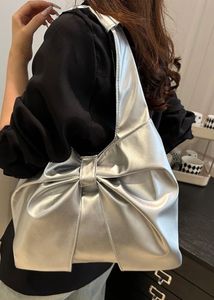 Chic Silver Bow Detail Handbag