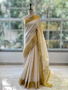 Elegant Cream & Gold Saree
