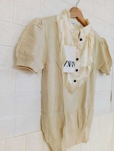 Elegant Beige Ruffle Blouse