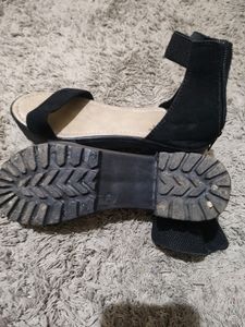 Black Heels With Back Zip Style.