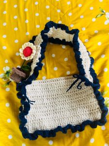 Crocheted Bag with Flower Accent