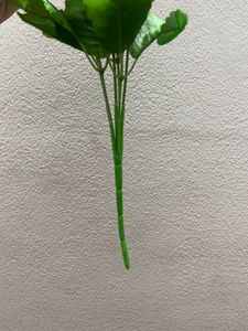 Artificial flowers Red and white with green leaves