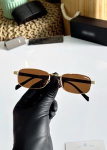 Prada Sunglasses - Gold &amp; Black