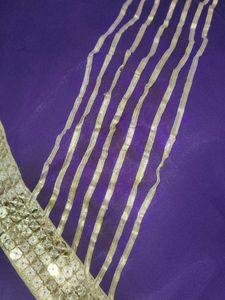 Elegant Purple Gown with Gold Embellishments