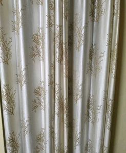 Elegant Cream Curtains with Coral Design