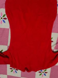 Red Knit Sweater with Black Geometric Pattern