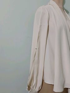 Elegant Sheer Blouse with Bow Detail