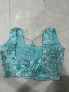 Blue embellished blouse