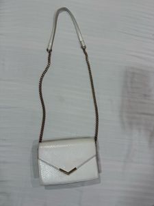 accesorize london sling bag