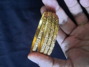 Set of Four Ornate Bangles And Two thick Bangle