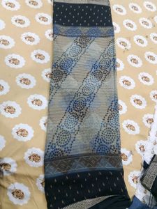 Elegant Black Saree with Blue Bandhej  Print
