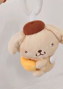 Sanrio Angel Pompompurin  holding a smalll