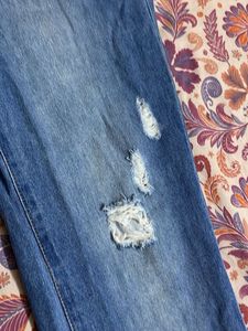 Distressed Patchwork Jeans