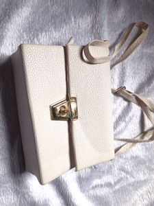 Elegant Cream Clutch Bag
