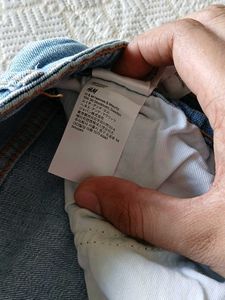 Distressed Light Wash Denim Jeans