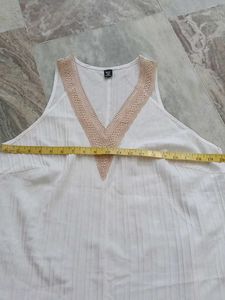 White Sleeveless V-Neck Top with Crochet Trim