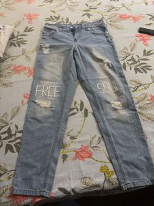 Distressed Light Wash "FREE" Jeans