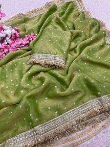 Elegant Green Saree with Silver Motifs