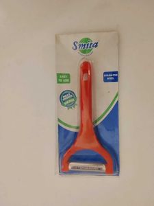 Pizza cutter and peeler