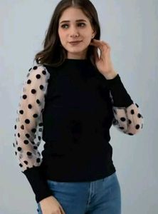Chic Black Top with Polka Dot Sleeves