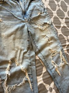 Distressed Light Wash Denim Jeans