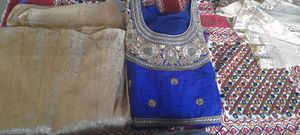 Party wear skirt, kurti n duppatta. Golden embroidery on kurti.Gr8 colour combination. Skirt is shining golden perfect for marriage 💑.Used Twice , No Flaws