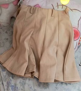 beige skirt or skort with in-built shorts