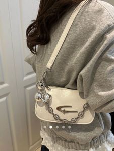Chic White Shoulder Bag with Charms