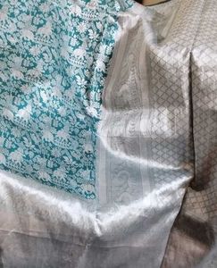 Beautiful Teal Saree with Silver Weave