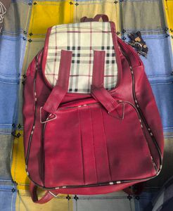 Stylish Red Backpack with Plaid Detail