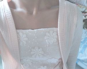 Beige colour a sleeveless patchwork top