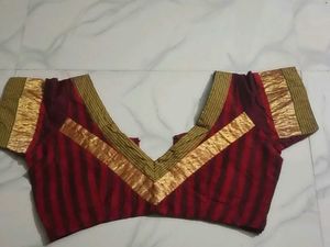 GentlyUsed Elegant MaroonBlouse withGoldenMotifs
