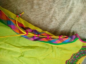 Vibrant Yellow Kurta with Embellished Neckline