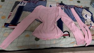pink ribbon top.NOT WORN EVEN ONCE.size32-38