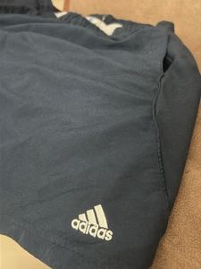 A Navy blue Adidas sports shorts