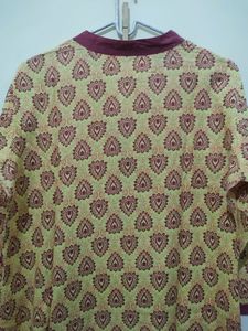 Ruhaans Yellow Kurta With Maroon Prints And Trim