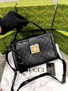 GUCCI* *PADLOCK BAG FEATURING THE ICONIC GG
