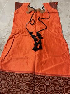 Vibrant Orange Kurta Set with Black Dupatta