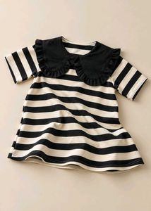 BLACK AND WHITE STRIPED TOP WITH RUFFLED COLLAR