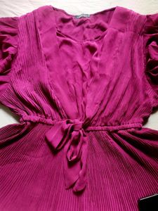 A beautiful decent purple top with florry sleeves